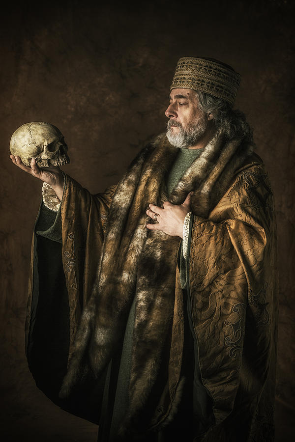 Hamlet by William Shakespear holding skull in his hands Photograph by Aluxum