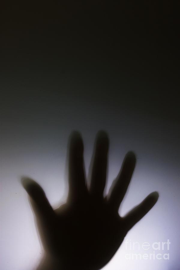 Hand against a window Photograph by Simon Bratt