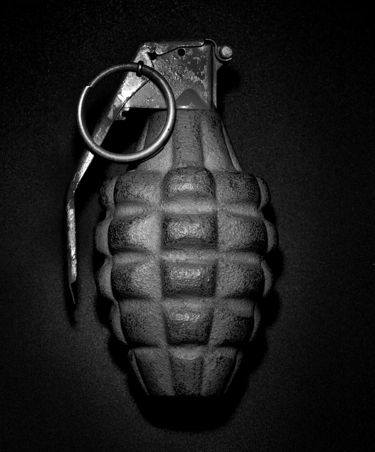 Hand grenade Photograph by John Kuczala