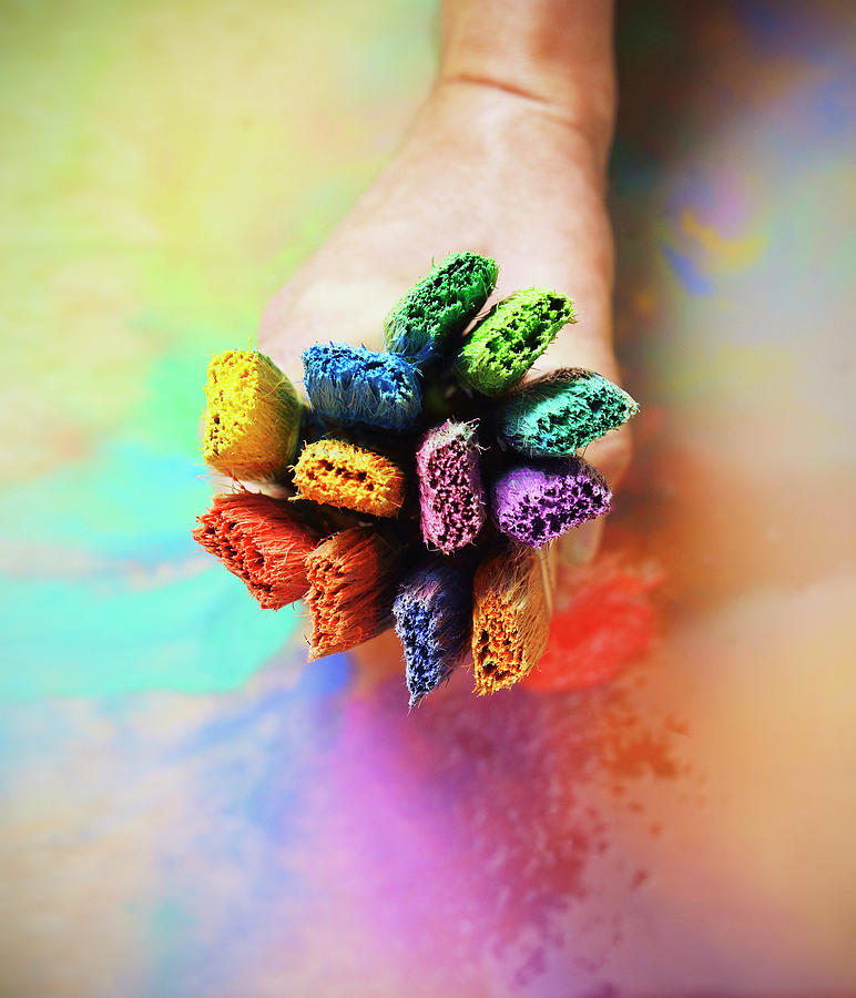Hand Holding Multi Coloured Paint Photograph by David Malan