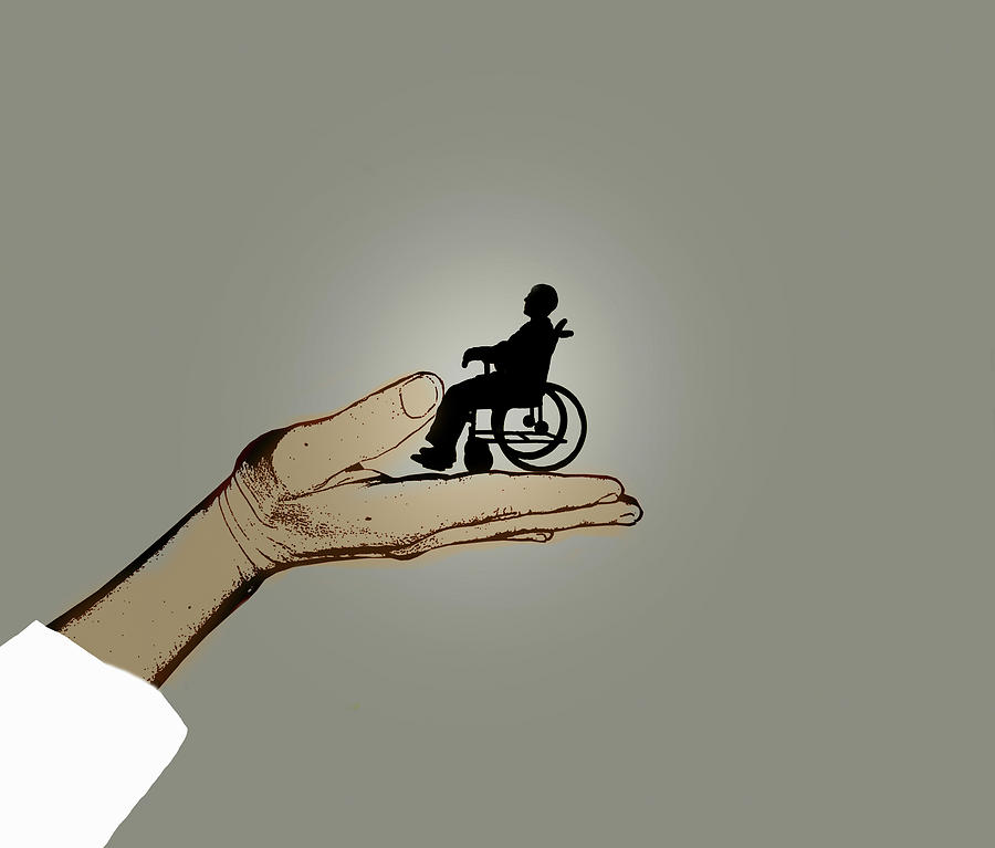 Hand Supporting Man In Wheelchair Photograph by Ikon Ikon Images