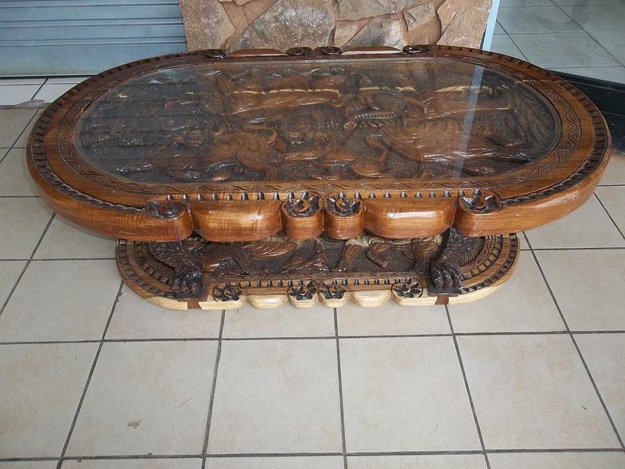 Coffee Sculpture - Handcrafted African Big five Coffee Table by Untitled