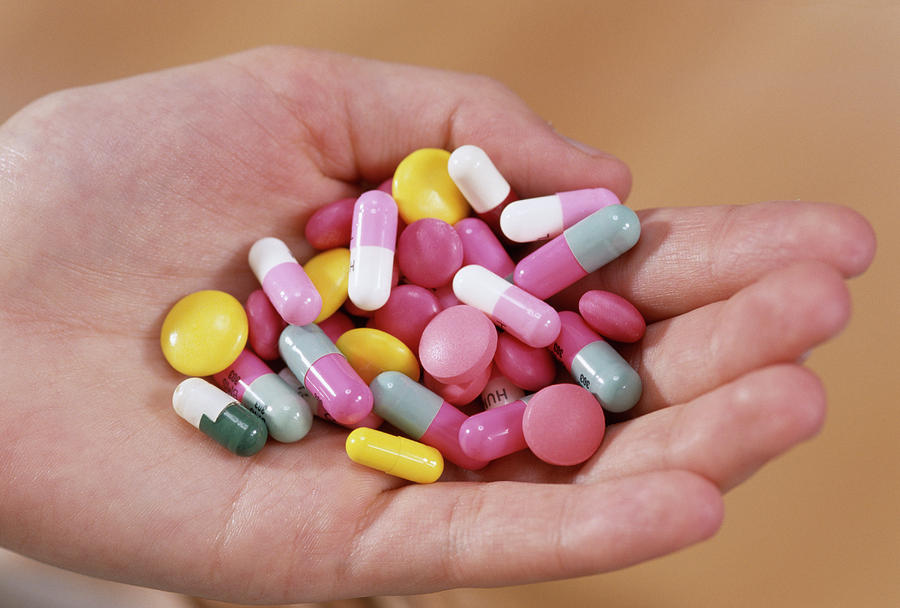 Handful Of Pills by Lea Paterson/science Photo Library