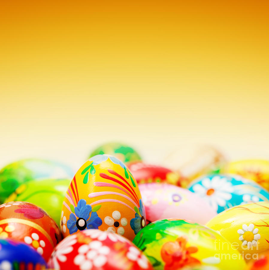 Easter Photograph - Handmade Easter eggs on orange sky by Michal Bednarek