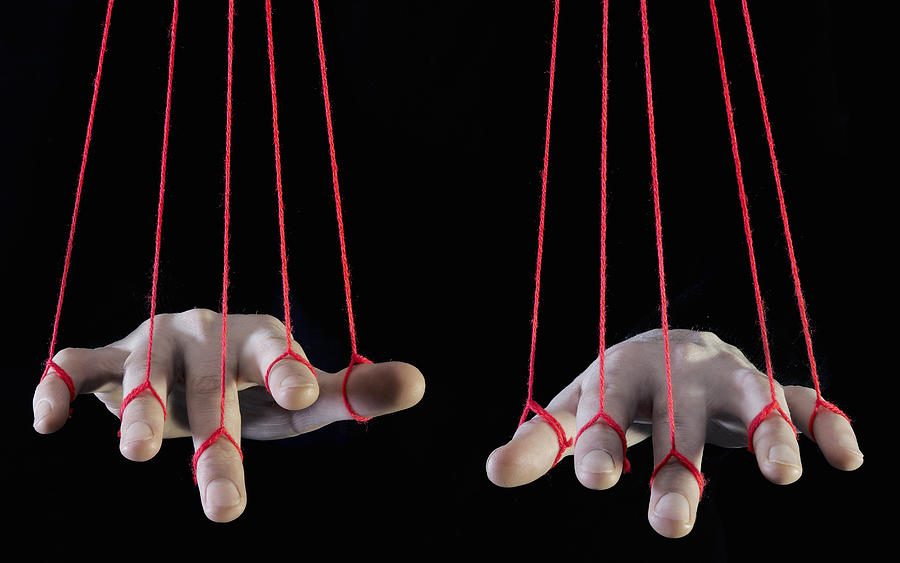 Hands Being Supported By String Photograph by Tara Moore