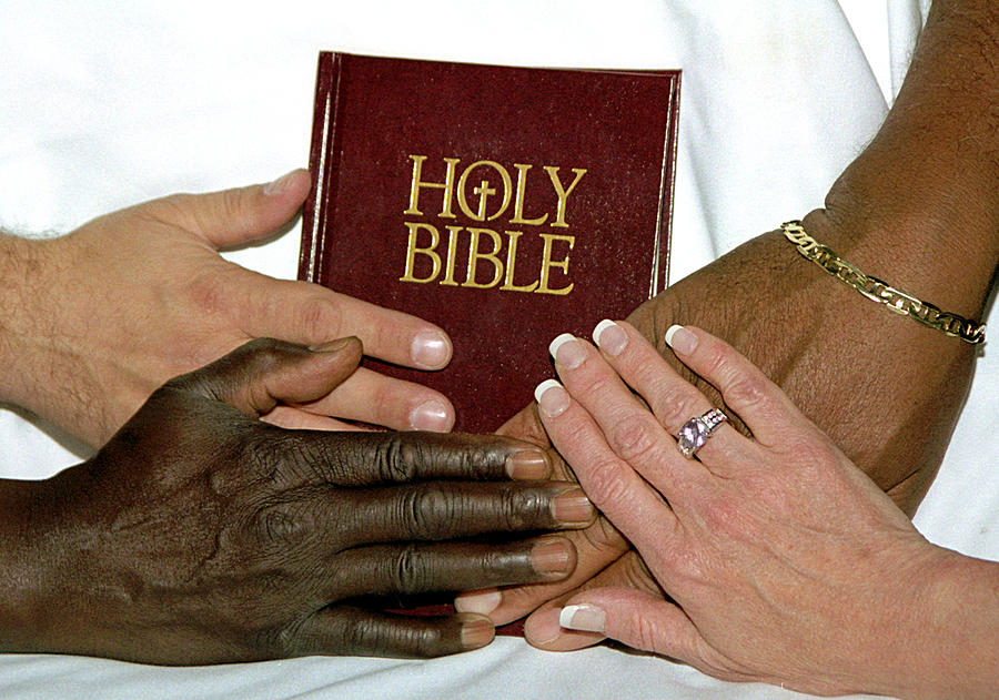 Holy Bible Photograph - Hands on Bible by Steve Archbold