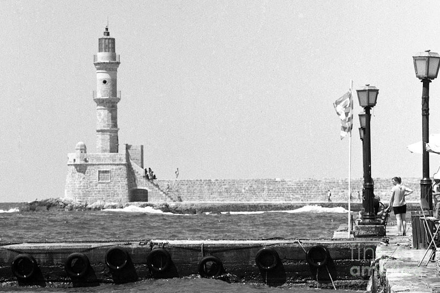 Hania lighthouse and quay Photograph by Paul Cowan