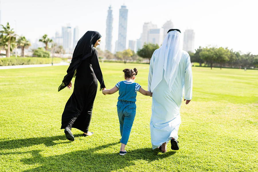 Happiness Family Walking In The Park In Dubai Photograph by Franckreporter