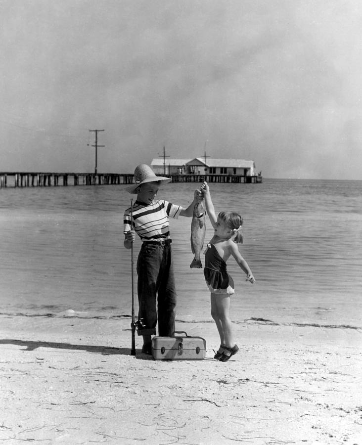 Happy fishing Photograph by Retro Images Archive - Pixels