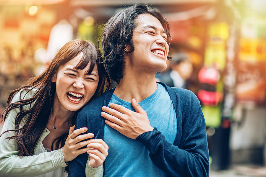 Happy Japanese couple Photograph by Pixelfit