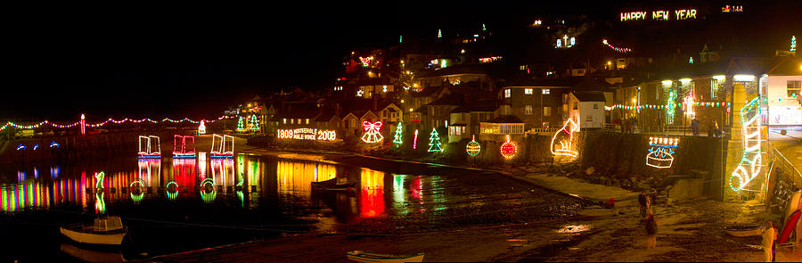 Happy New Year Mousehole Christmas lights, Cornwall. Photograph by Tony Mills