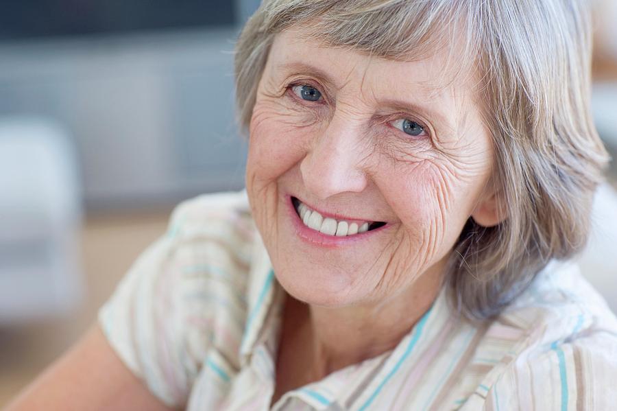 Happy Senior Woman Photograph by Ian Hooton/science Photo Library