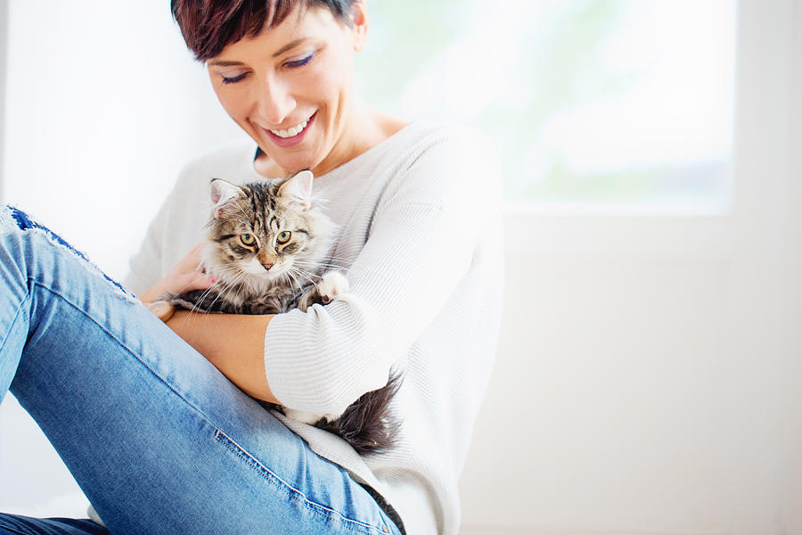 Happy Woman Portrait with her Cat Photograph by CasarsaGuru