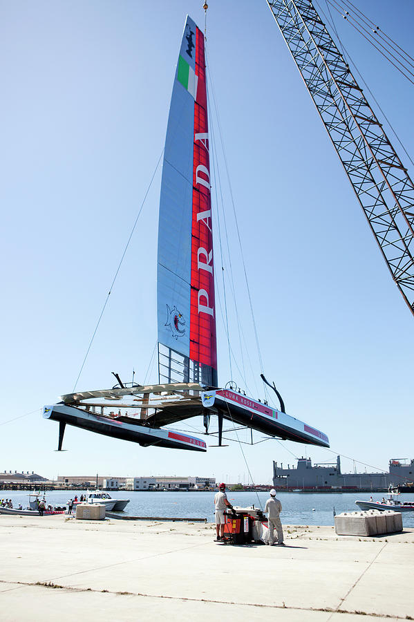 Harbor Crane Lifting Yacht Photograph by Christophe Launay
