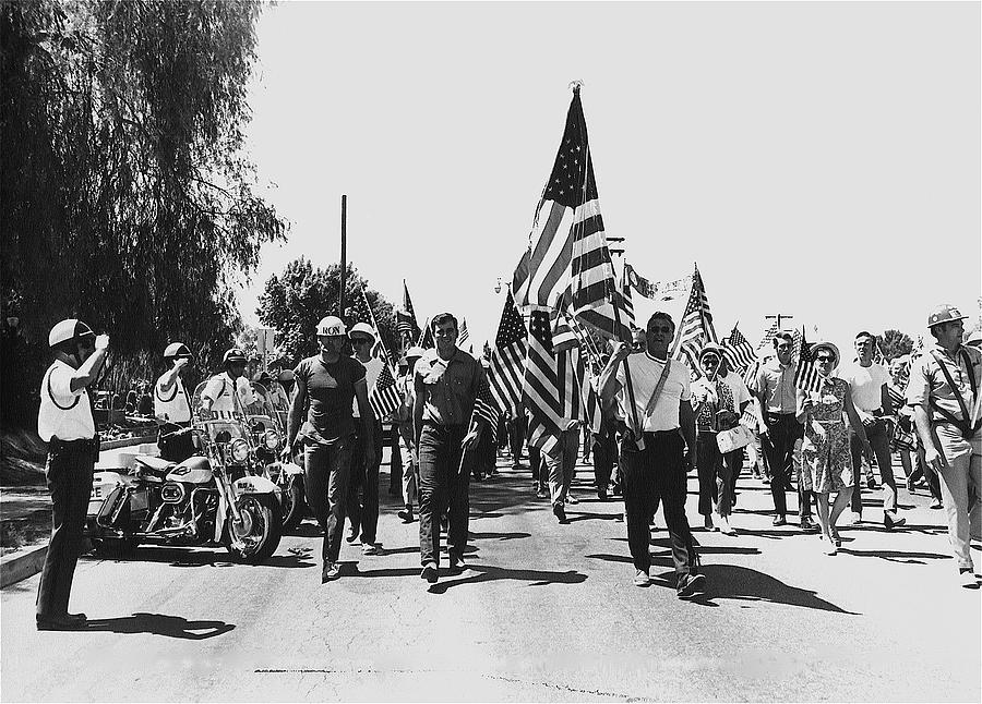 Hard hat pro-Viet Nam War march saluting cops Tucson Arizona 1970 black and white Photograph by David Lee Guss