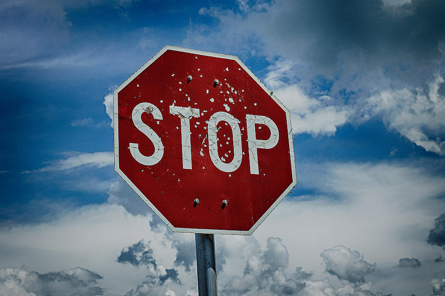 Hard Life of a Stop Sign Photograph by Dan Dennison - Fine Art America