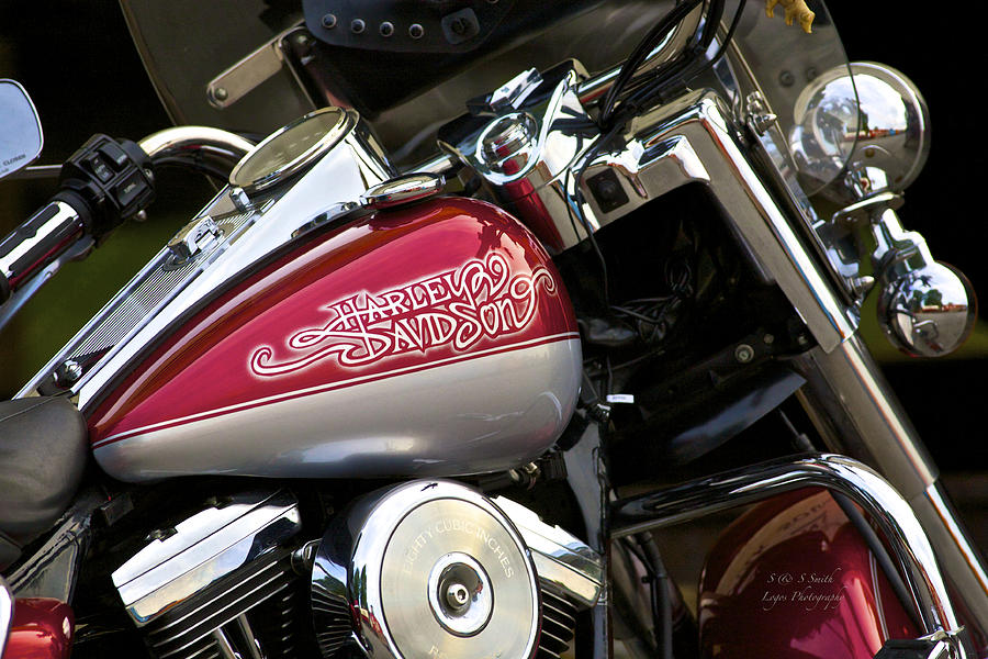 Harley Davidson dressed in red and silver and chrome. Photograph by Steve and Sharon Smith