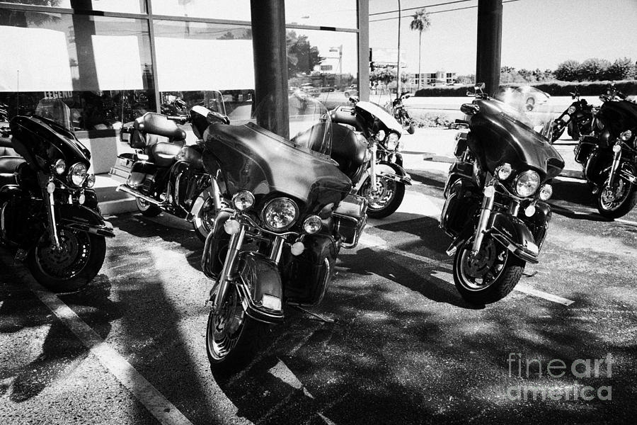 Motorcycle Photograph - Harley Davidson Touring Motorbikes Including Electra Glide Outside Dealership In Orlando Florida Usa by Joe Fox
