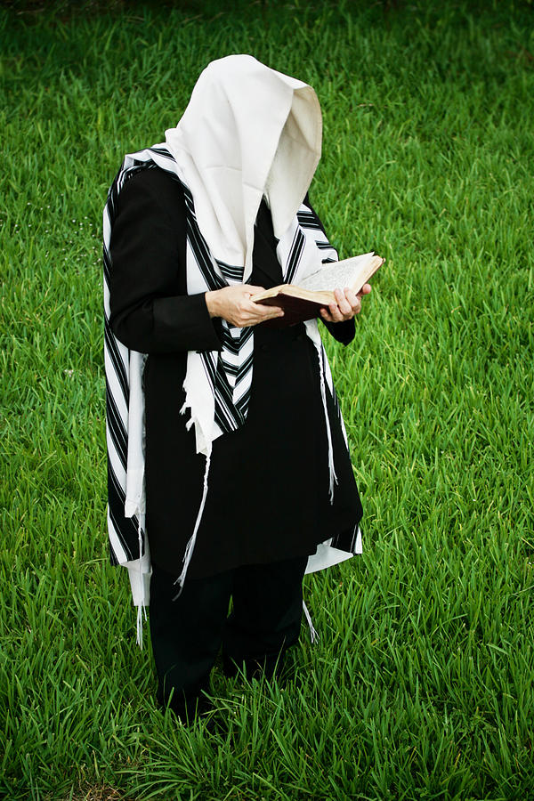 Hassidic Man Praying in a Field of Grass Photograph by Tovfla