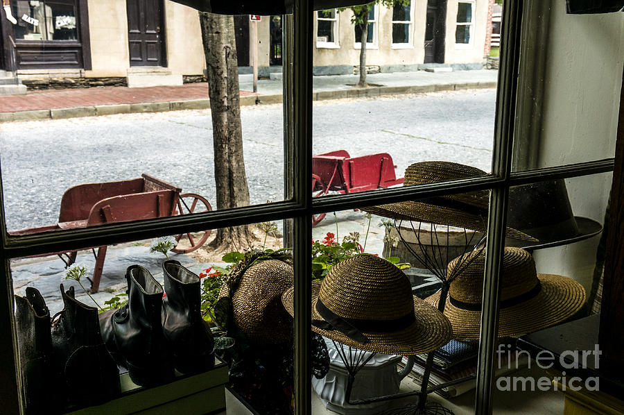 Hats and shoes show in the window of a Civil War period shop at Harpers Ferry West Virginia Photograph by William Kuta