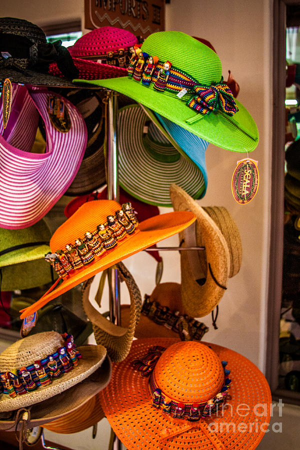 Hats Hats and More Hats Photograph by Jim McCain