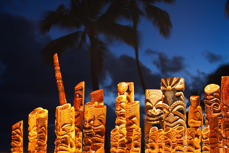 Hawaiian tiki mask art and blue palm tree sky. Photograph by Jimkruger