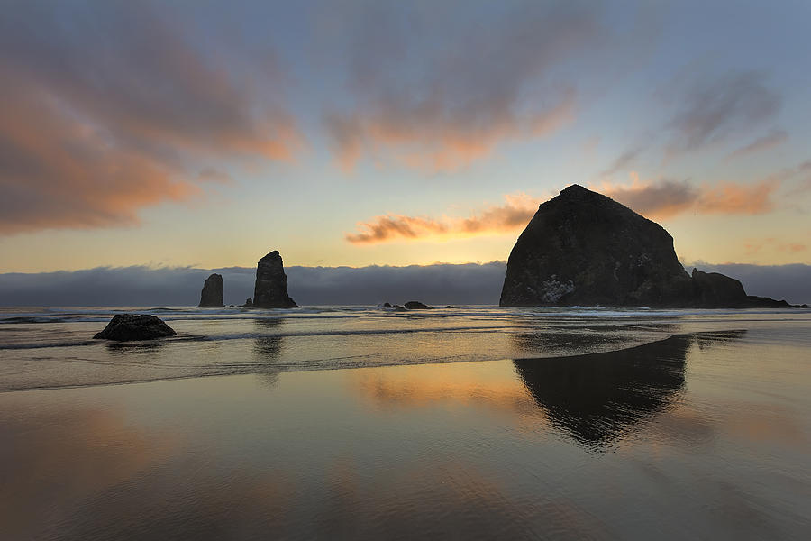 Haystack and Sunset along Oregon Coast Photograph by David Gn