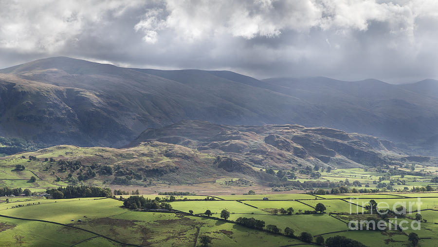 Landscape Photograph - Hazy Sunbeams Over Castlerigg Stone Circle Viewed From Latrigg by Chris Blake