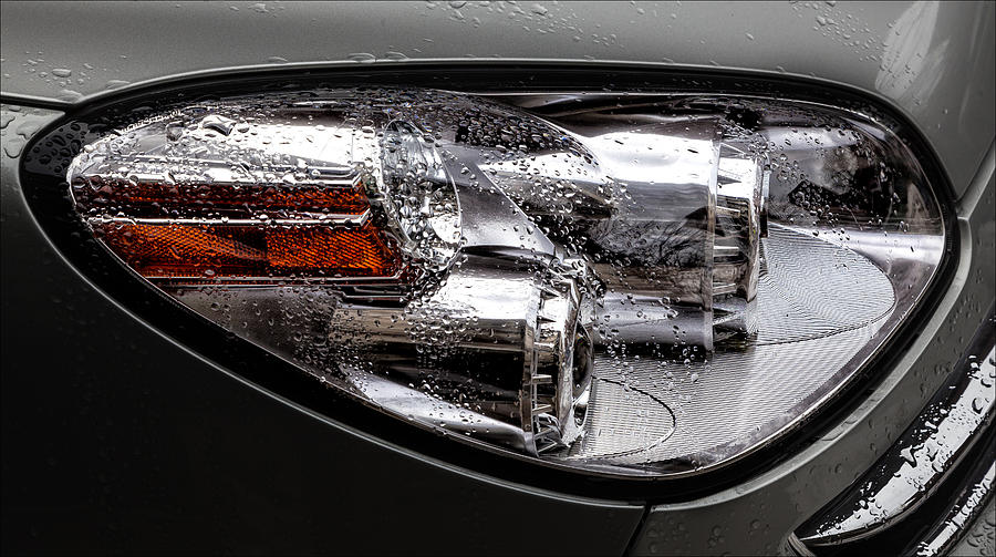 Headlight and Raindrops 2 Photograph by Robert Ullmann