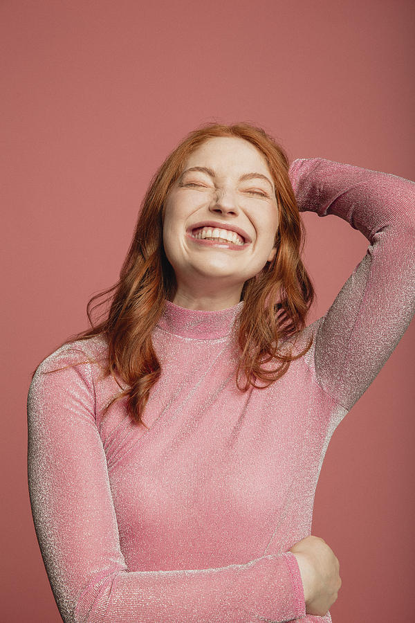 Headshot of a Smiling Redhead Photograph by SolStock