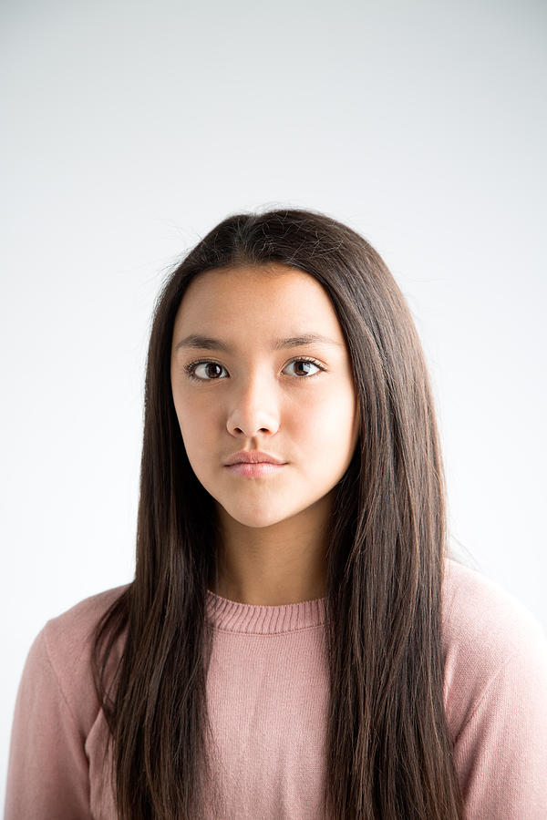 Headshot portrait of preteen mixed race girl Photograph by Gary John Norman