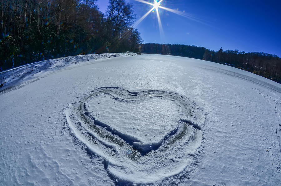 Heart Outlined On Snow On Topw Of Frozen Lake Photograph by Alex Grichenko
