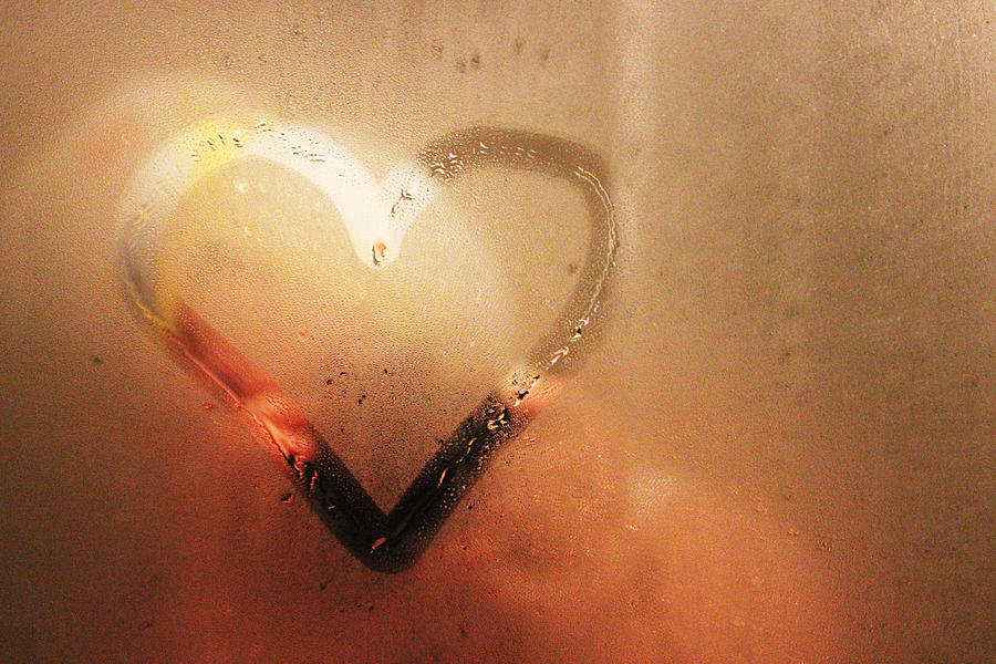 Heart painted on bathroom mirror Photograph by Lisa Schaetzle