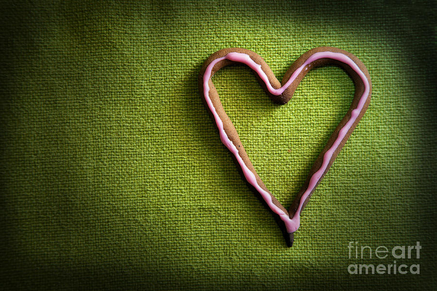 Heart shape candy on green Photograph by Michal Bednarek