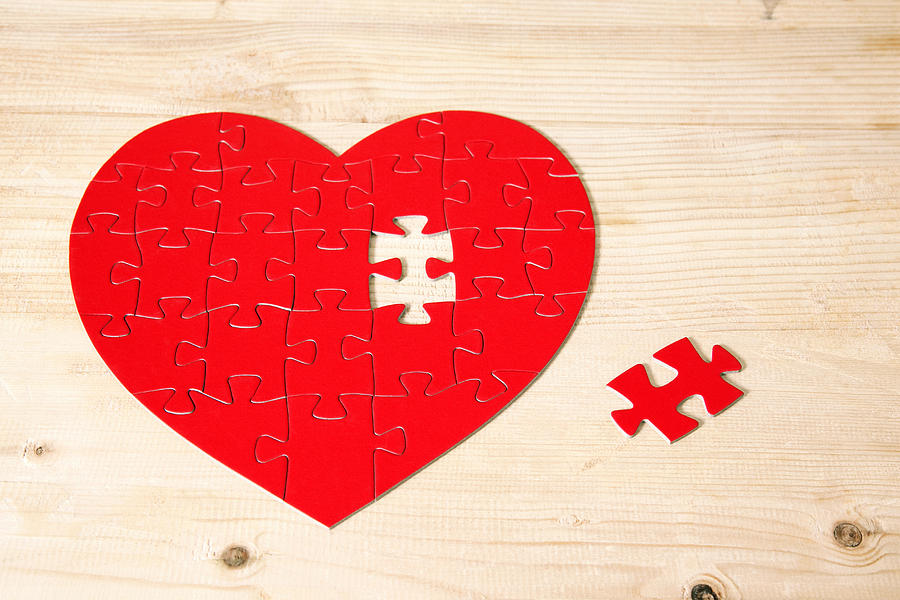 Heart shaped jigsaw puzzle with missing piece Photograph by Image Source