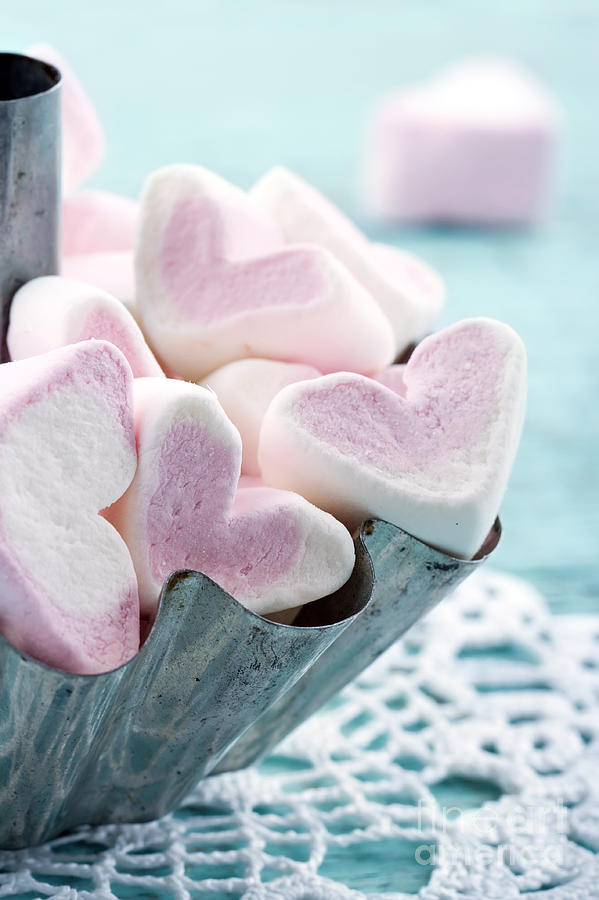Heart shaped marshmallows in a metal cupcake Photograph by Anna