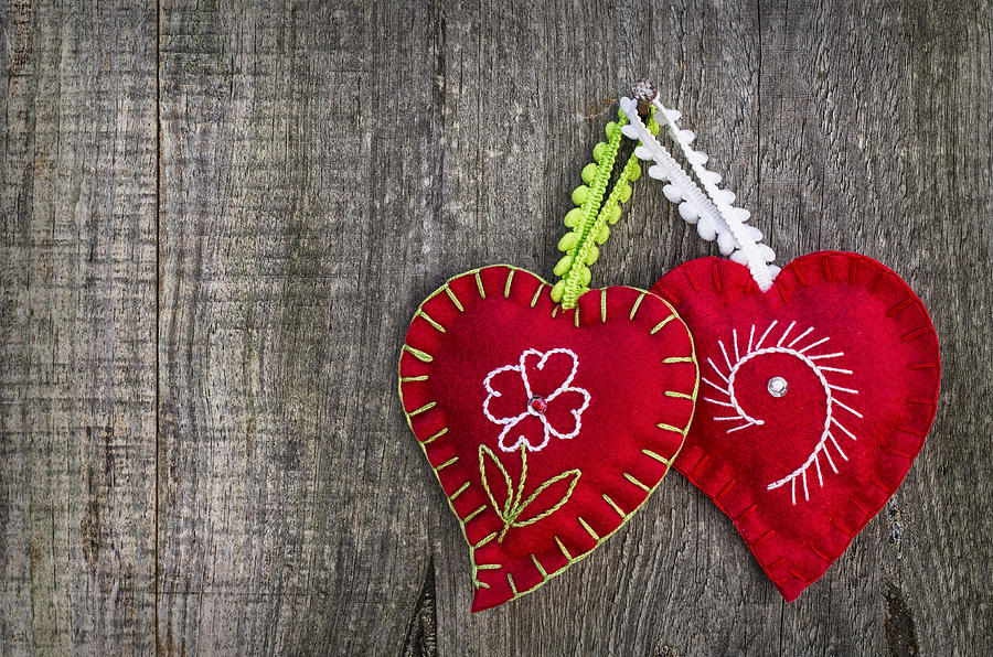 Hearts in wood background Photograph by Paulo Goncalves