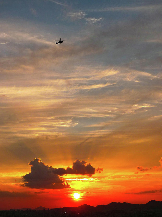 Helicopter Above Sunset Photograph by Fidelis Simanjuntak