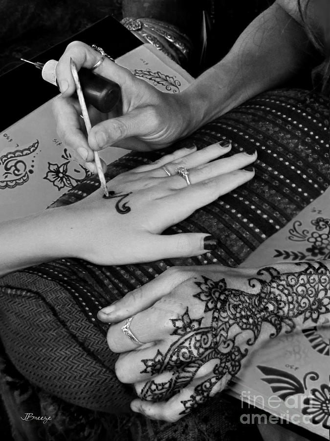 Henna Artist at Play Photograph by Jennie Breeze