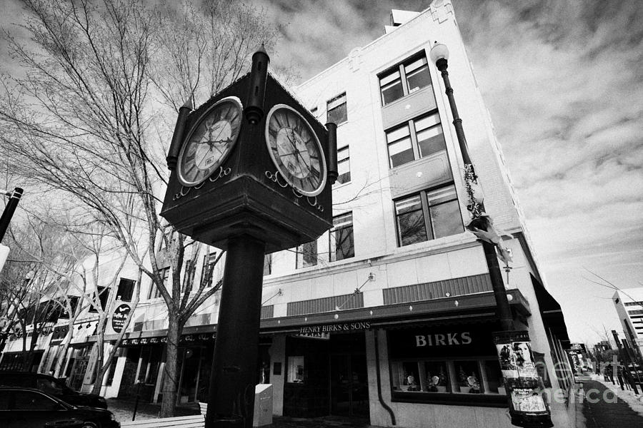 City Photograph - henry birks and sons jewellry store and town clock downtown Saskatoon Saskatchewan Canada by Joe Fox