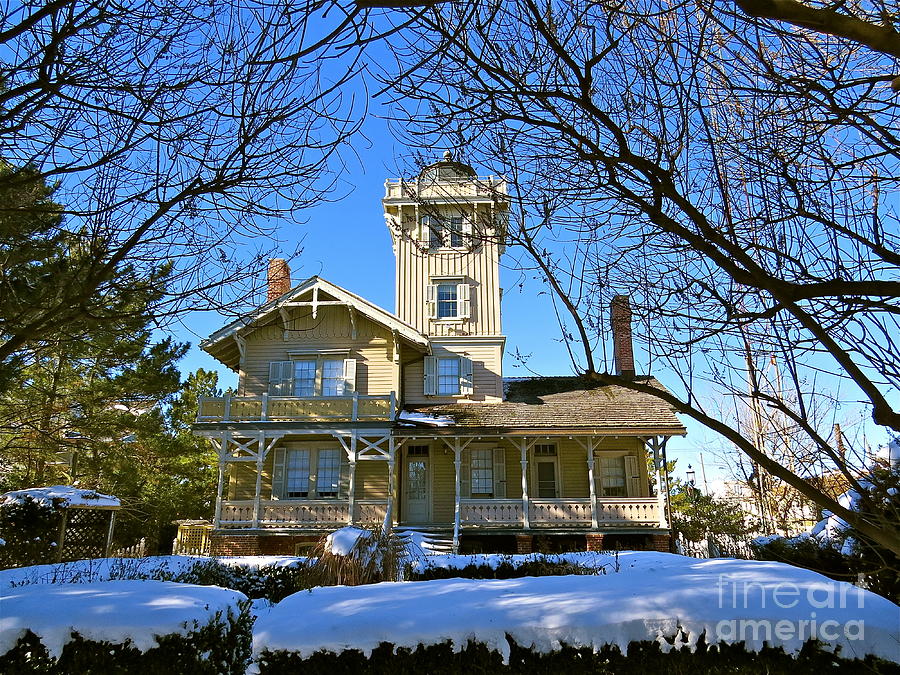 Hereford Inlet Lighthouse in the Snow  Photograph by Nancy Patterson