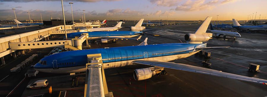 Transportation Photograph - High Angle View Of Airplanes At An by Panoramic Images