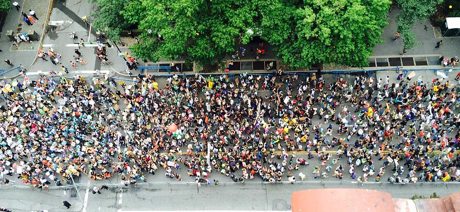 High Angle View Of Crowd Marching On Street By Tree Photograph by Young Sam Green / EyeEm