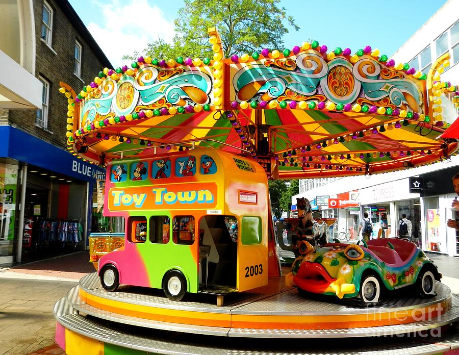 High Street Carousel Photograph By Loreta Mickiene Fine Art America