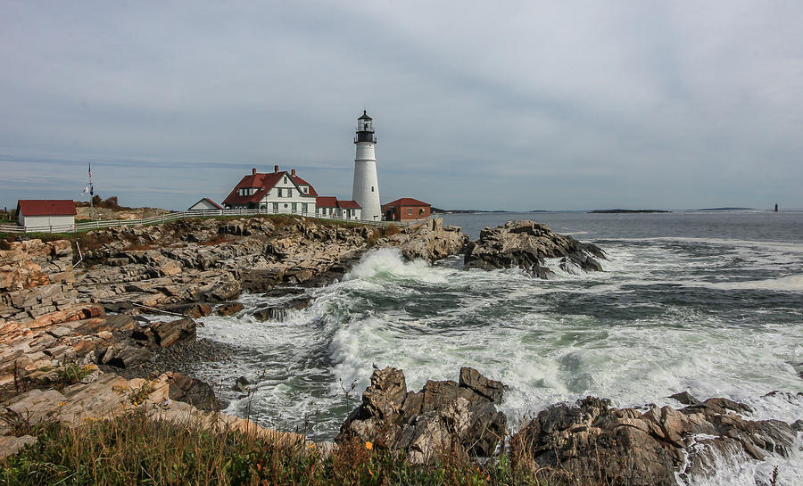 High tide at the lighthouse Photograph by Jane Luxton