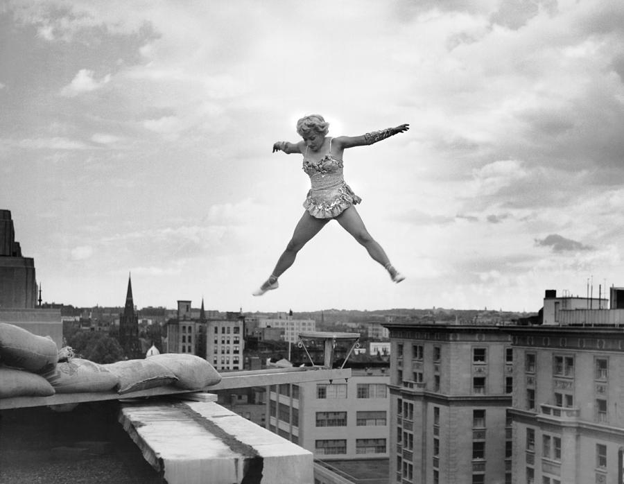 High Up Acrobatics Photograph by Underwood Archives - Fine Art America