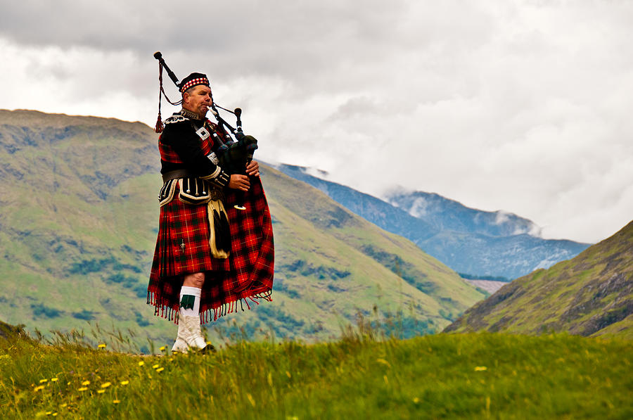 Highland bagpiper in kilt Photograph by British Modern Photography