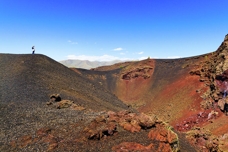Hiker Stands On Hill At Craters Of The Photograph by Anna Gorin