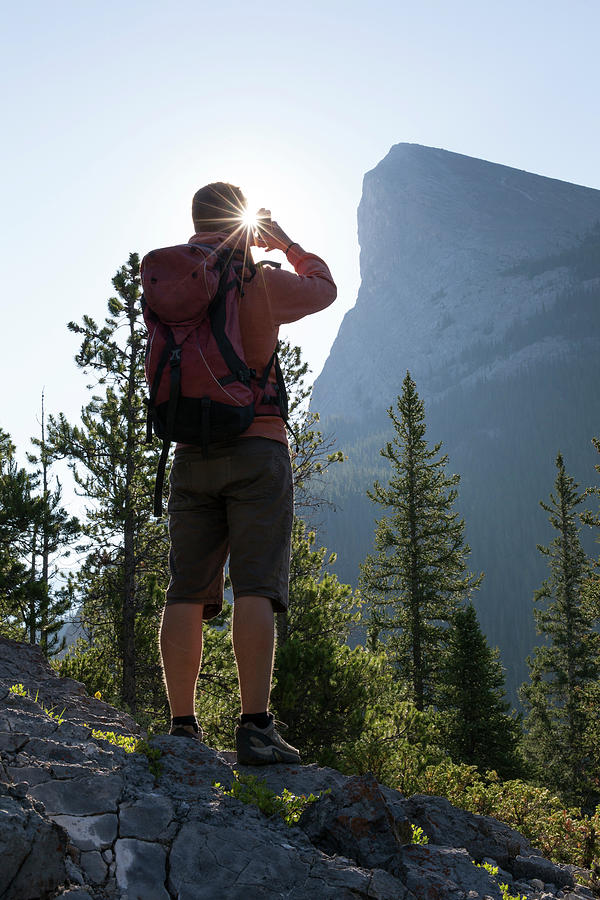 Mountain Photograph - Hiker Takes Picture With Smartphone by Philip & Karen Smith / TFA