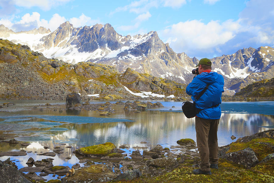 Hiker Taking Pictures of Alaska Mountain Range. Photograph by Scott Slone